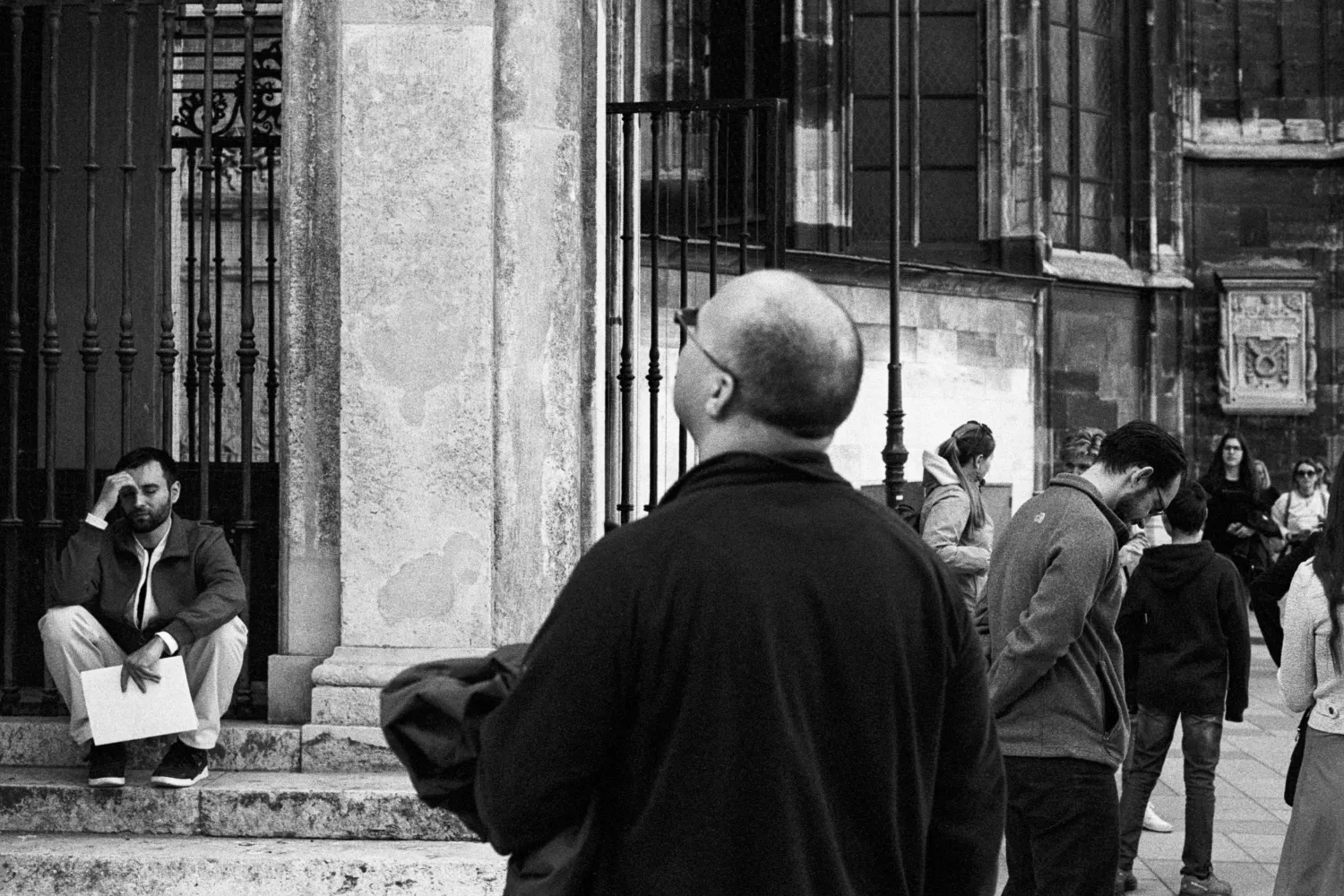 Three different looks and emotions of strangers captured at the church